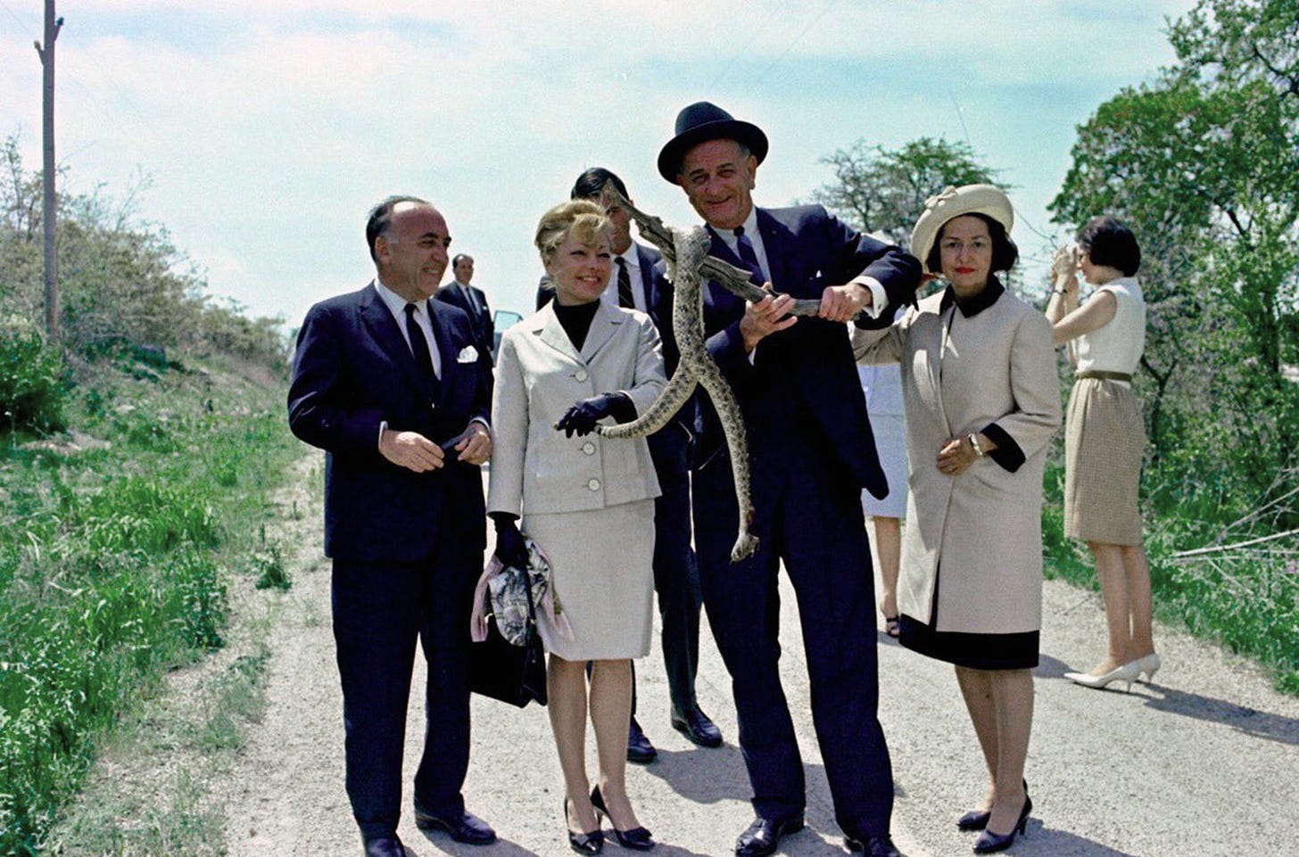 LBJ and Mathilde Krim — Irgun background, Likud lineage — posing with a snake. History rarely offers metaphors this literal.