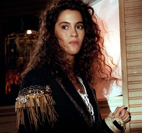 Photos of actors in scenes in the movie The Lost Boys.