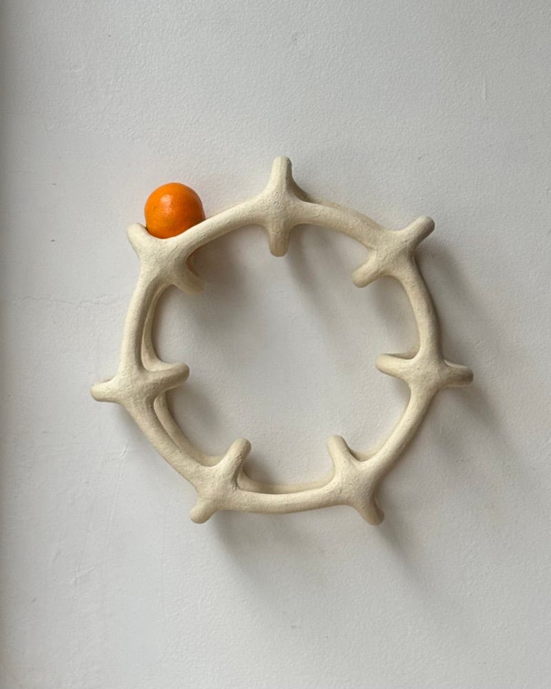 Image of Small beige wheel Image of Small beige wheel