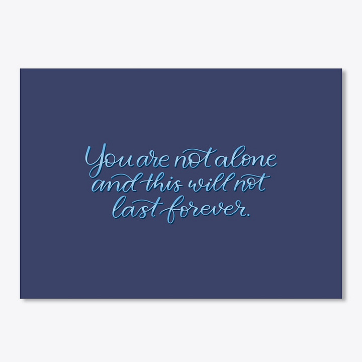 a sticker and a mug, both navy blue with light blue text that reads "you are not alone and this will not last forever"
