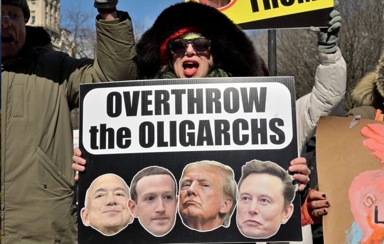 A group of people holding a sign

Description automatically generated