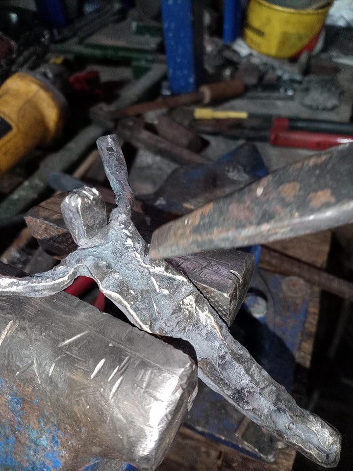 Adding the crown of thorns and the side-wound.