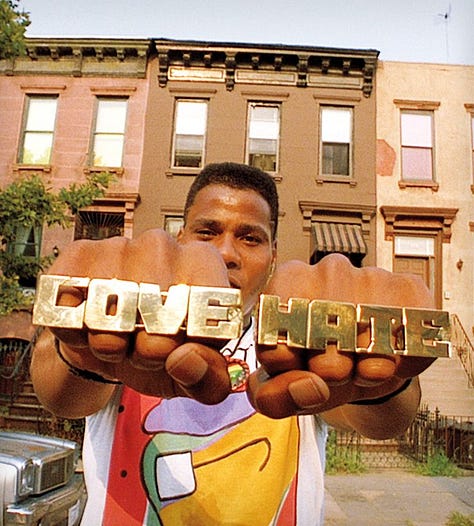 #1 Love/Hate knuckle rings #2 carnation held by Palestinian #3 Black Lady Justice #4 Uh huh written in honey #5 Ballet dancers in class #6 Senegal immigrant on subway
