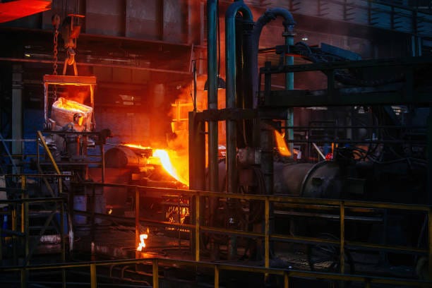 Metal casting process in metallurgical plant stock photo Metal casting process in metallurgical plant stock photo