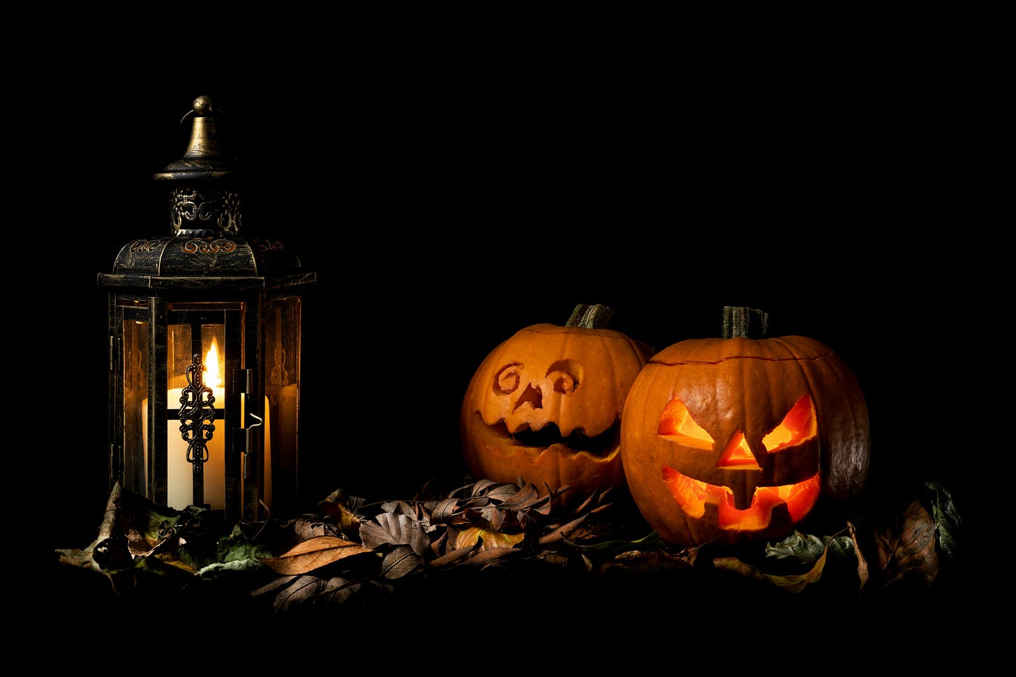 lantern with candle and halloween carved pumpkins lantern with candle and halloween carved pumpkins