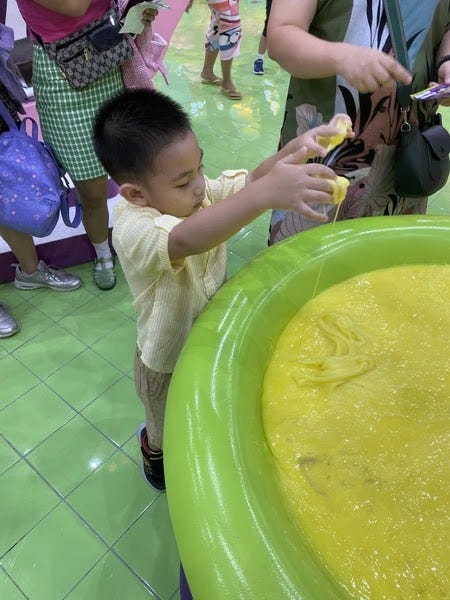Gootopia Little Rafa playing with slime at Gootopia