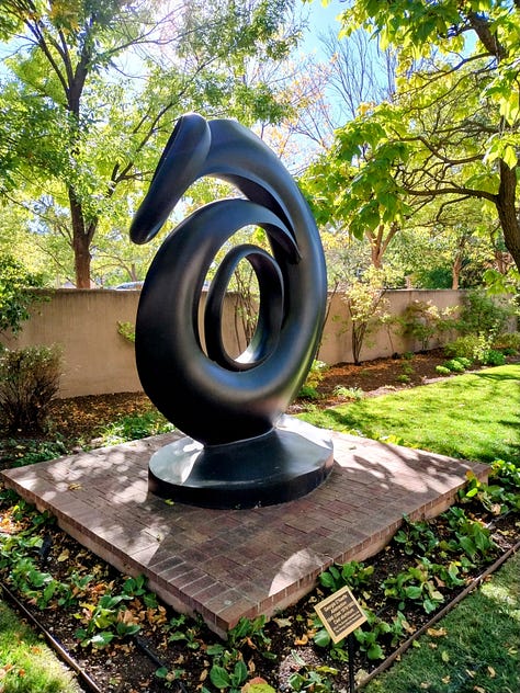 outdoor sculpture and photos of figurines from many peoples