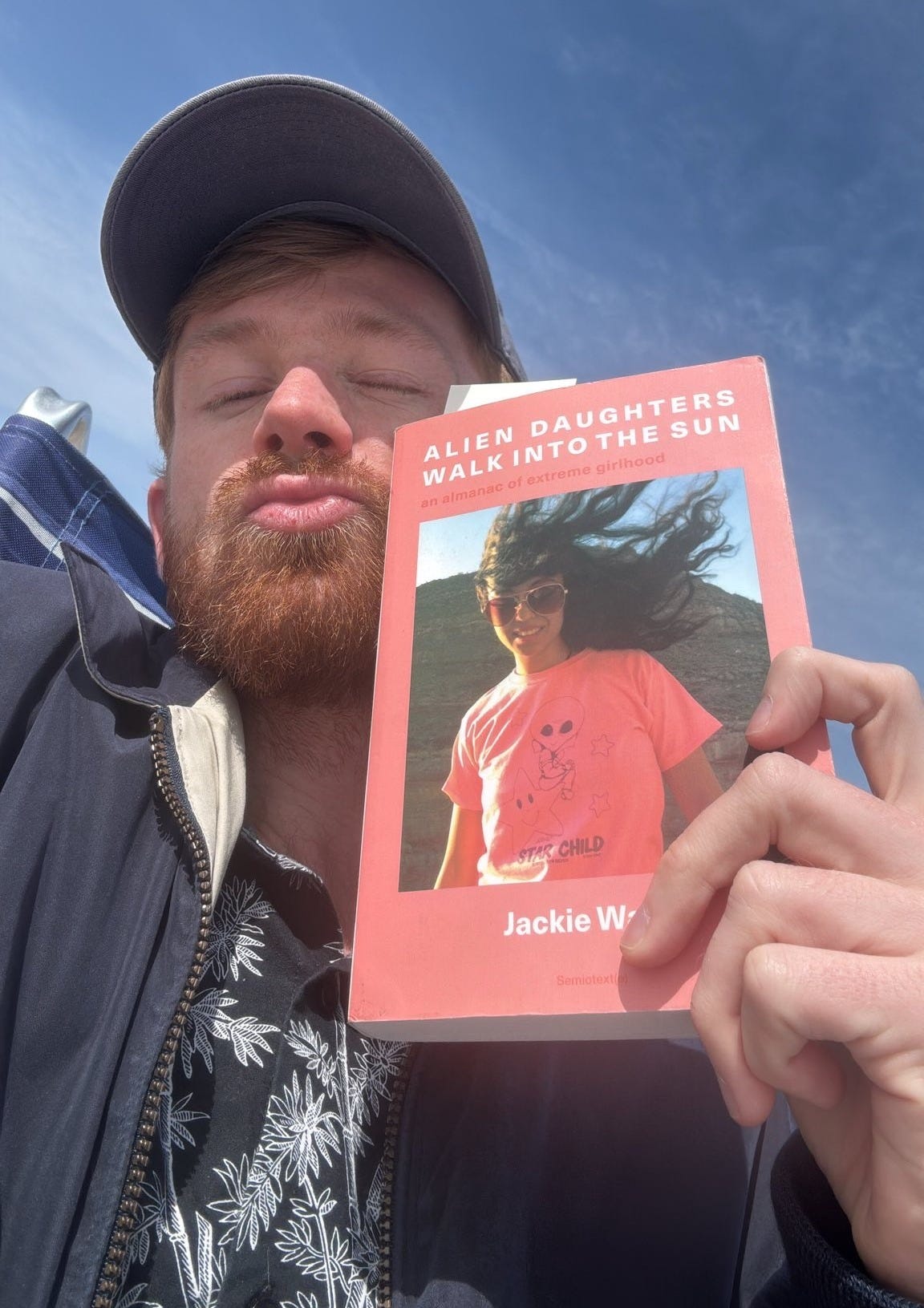 Will holding "Alien Daughters Walk Into the Sun" by Jackie Wang