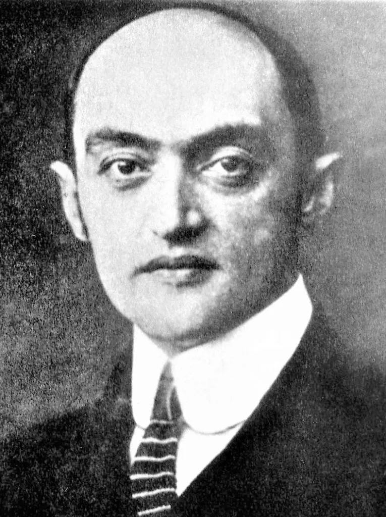 Black and white portrait photograph of economist Joseph Schumpeter, the Austrian economist who introduced the theory of creative destruction