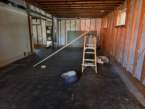 Three photos showing an empty basement ready to be renovated and finished.