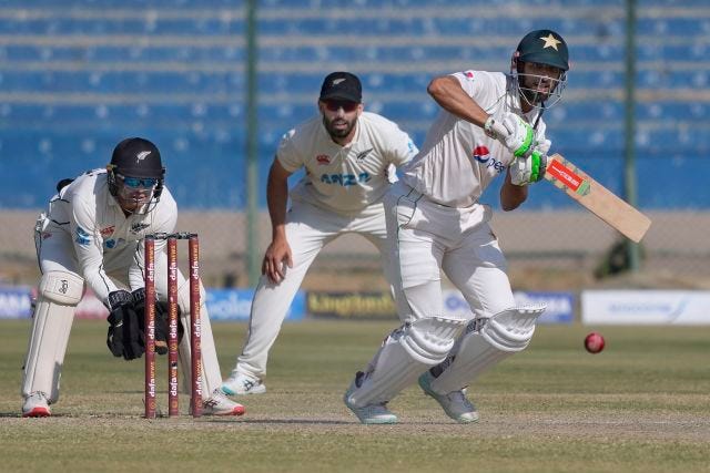 Shan Masood drives through the on side