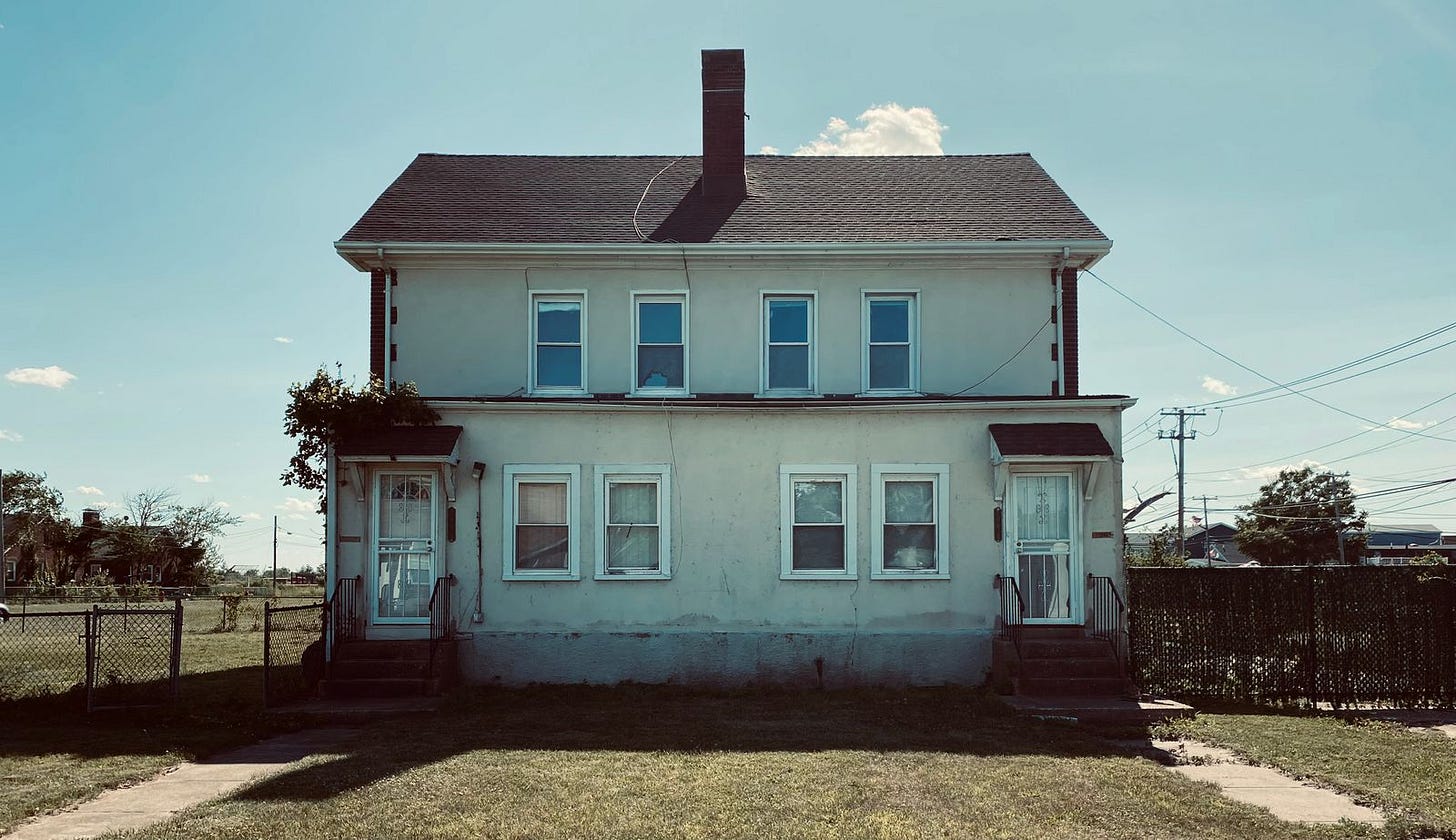 Modest two-story Texas rental house occupied by a tenant during a sale Modest two-story Texas rental house occupied by a tenant during a sale