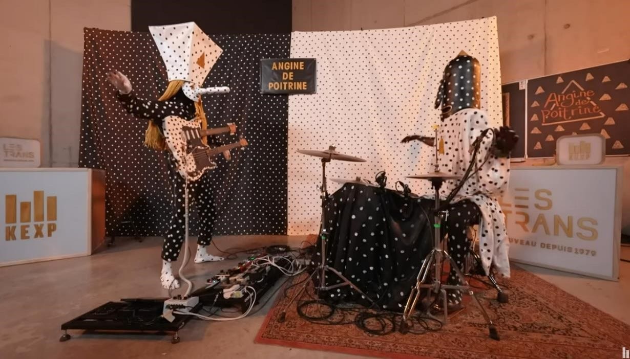 Photo of the band Angine de Poitrine from their set on KEXP. Not enough words to describe what they look like