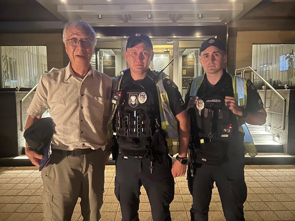 A group of men standing in front of a building

AI-generated content may be incorrect.