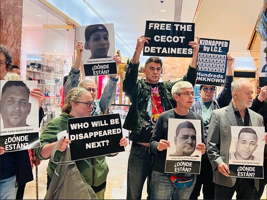 A group of people holding signs

AI-generated content may be incorrect.