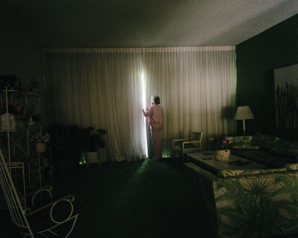 Mom Looking Through Curtain