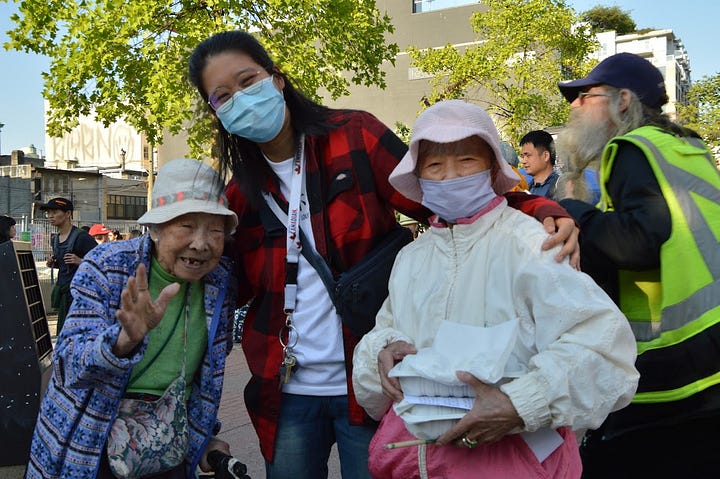 Photos of Mrs Chang at various rallies at 105 Keefer and City Hall
