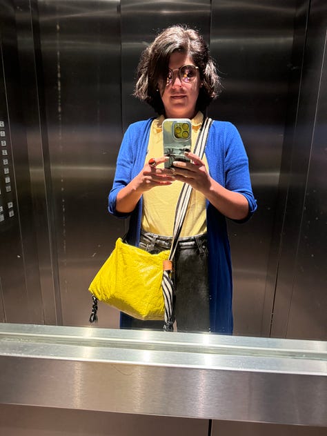 Left: Ines dressed in a green sweater and green dress. Center: Ines dressed in a bomber jacket, pink t-shirt and black faux leather pants. Right: Ines dressed in a bright blue cardi, a yellow t-shirt and black plants.