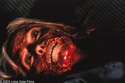 Infected body from Cabin Fever, a cabin horror film known for its graphic depiction of disease and isolation.