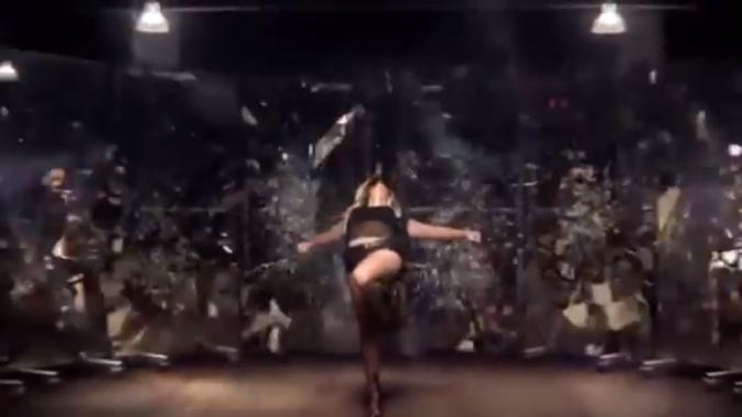 Beyonce shattering the reflection of her self in the mirrors behind her