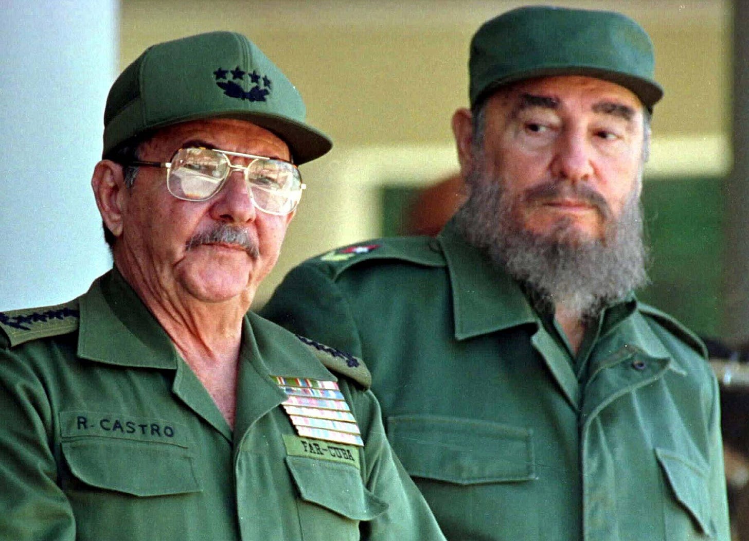 Raul and Fidel Castro preside over a ceremony marking the 100th anniversary of the death of independence hero Antonio Maceo, in Havana in December 1996.   | REUTERS