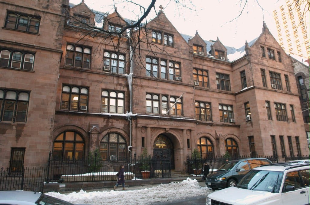 The Trinity School in New York City with snow on the ground.