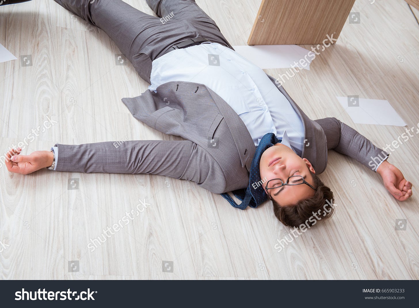 Businessman Dead On Office Floor Stock Photo 665903233 | Shutterstock
