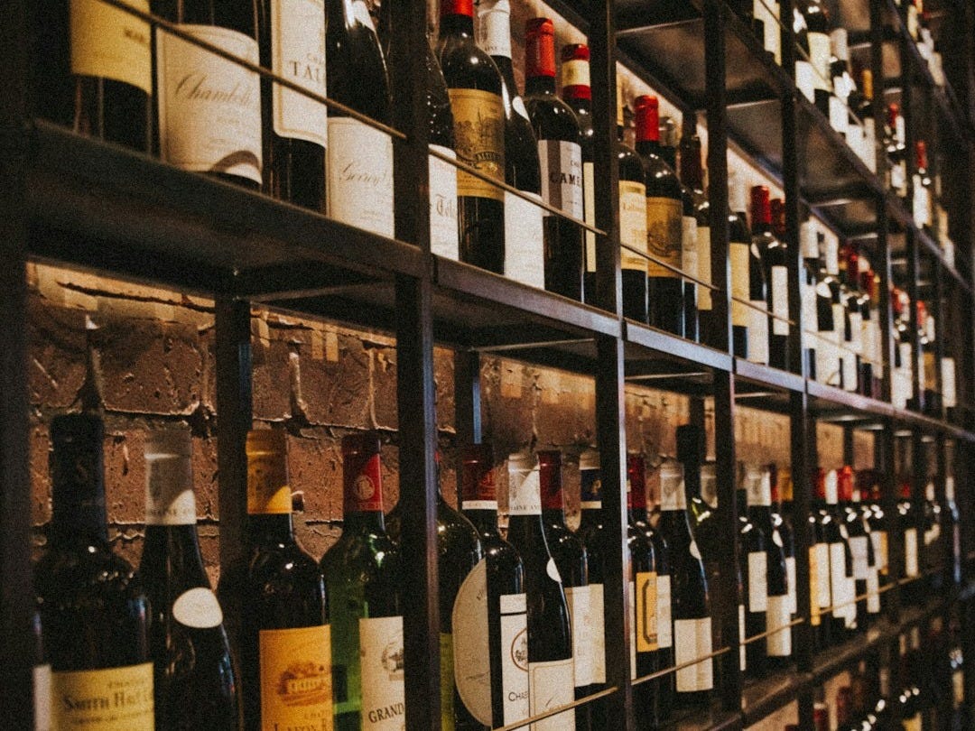 wine bottles on rack