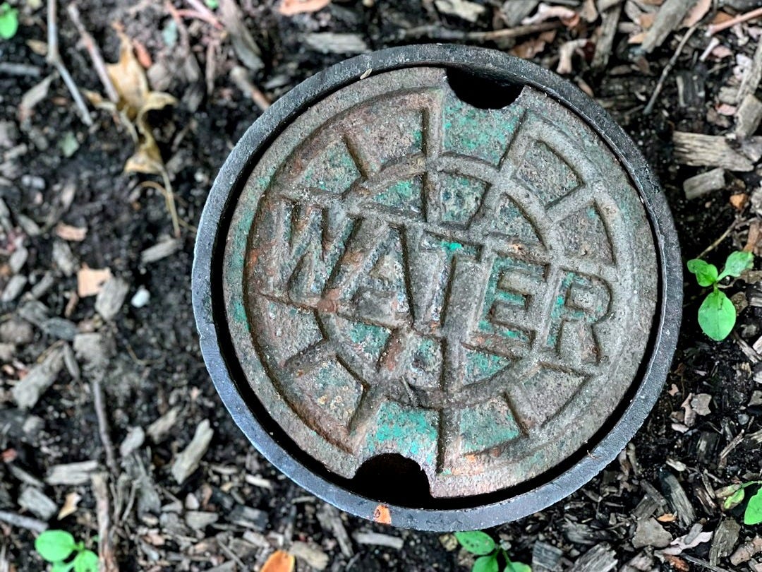 a round metal object on the ground