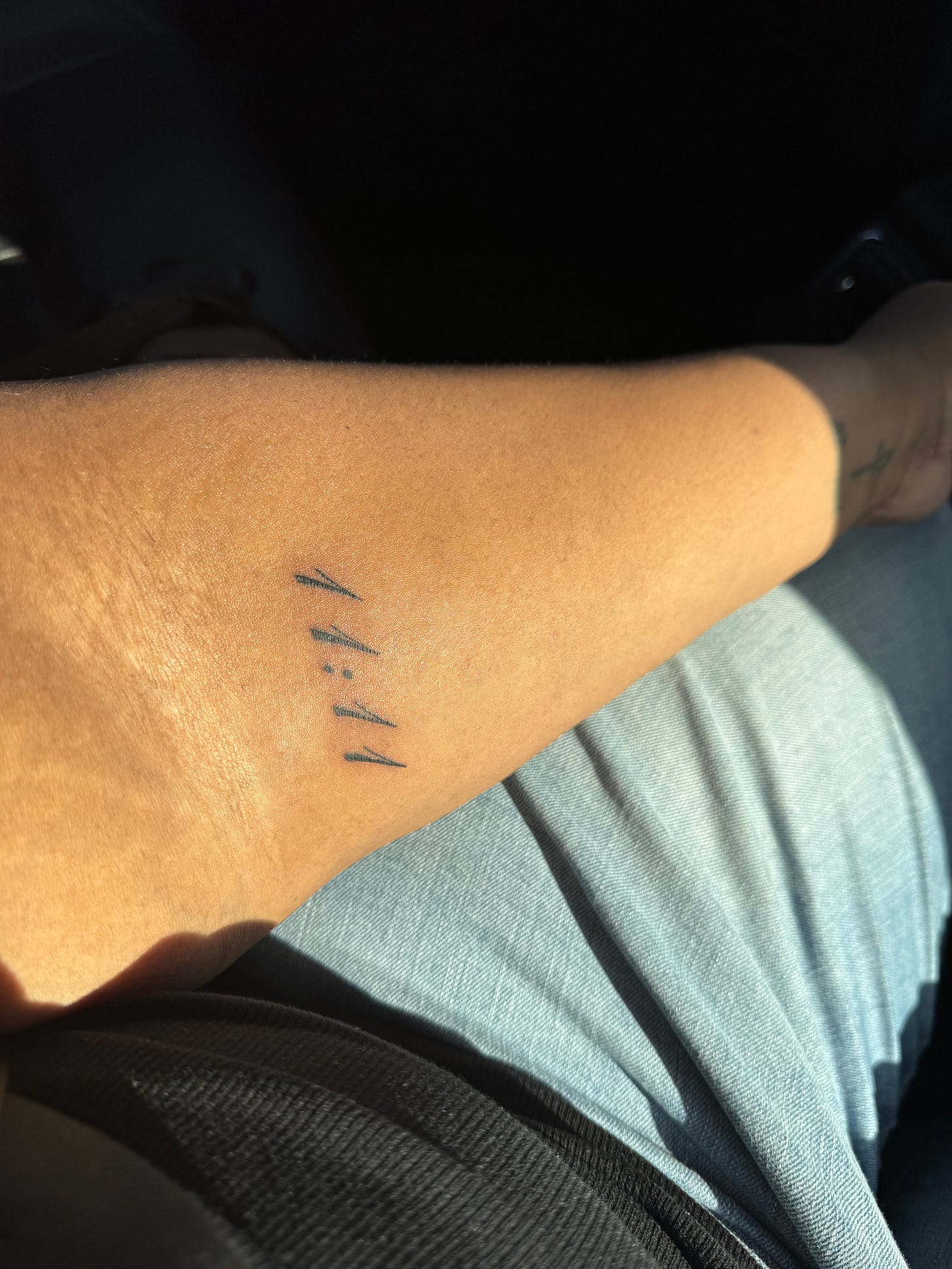 athena dixon 11:11 tattoo