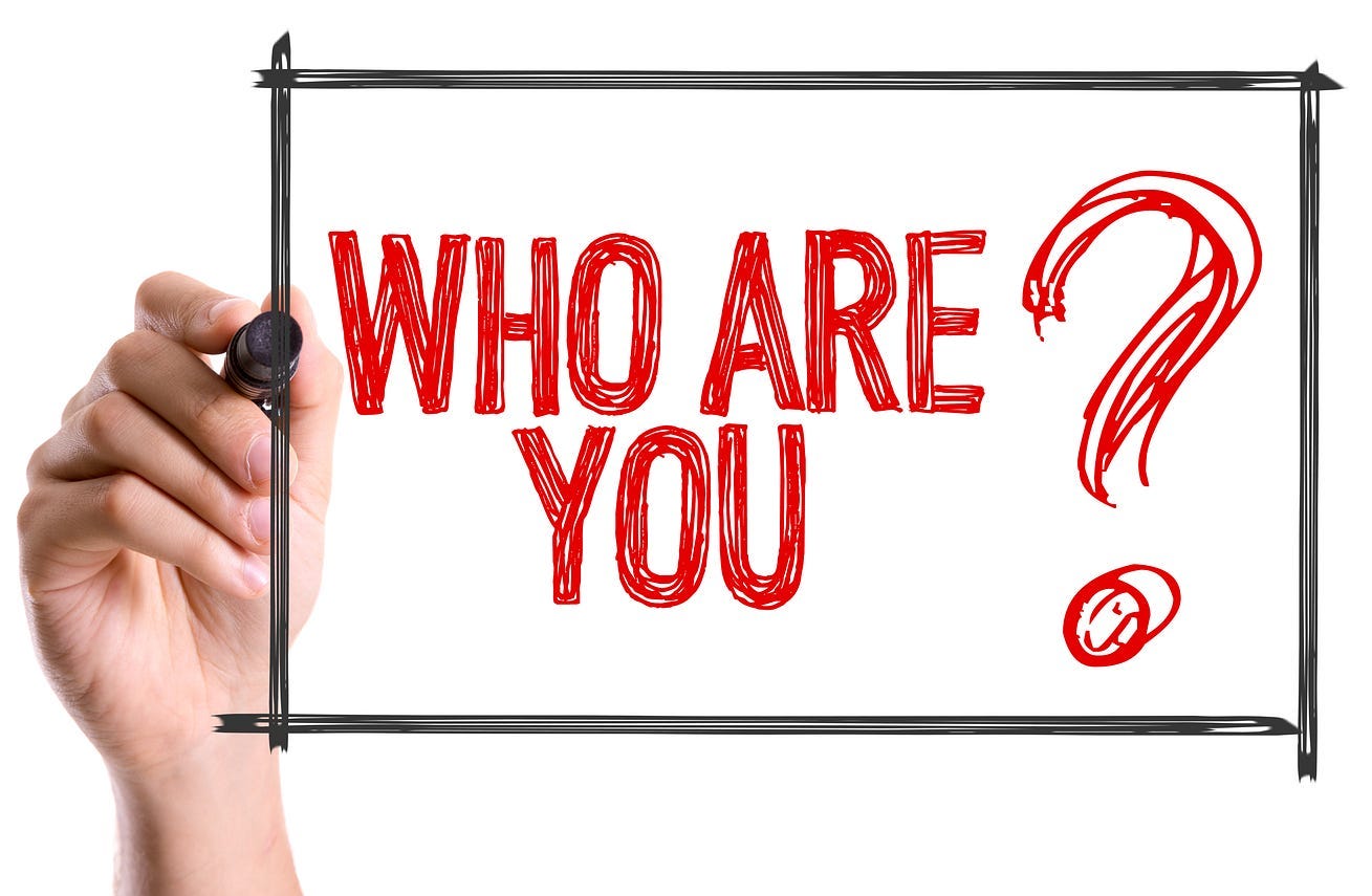 Hand with marker writing the word Who Are You? By gustavofrazao Hand with marker writing the word Who Are You? By gustavofrazao