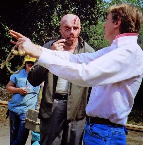 Richard Brooker taking direction as Jason Voorhees on the set of Friday the  13th: Part 3 - and yes, he's smoking a pipe. : r/fridaythe13th