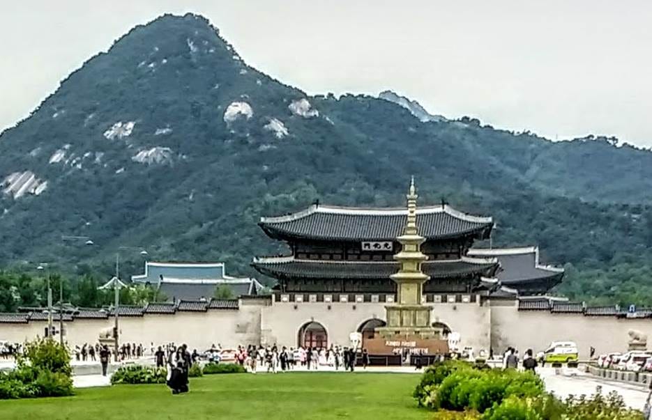 A building with a tall tower in front of a large building with a tall tower in the background

AI-generated content may be incorrect.