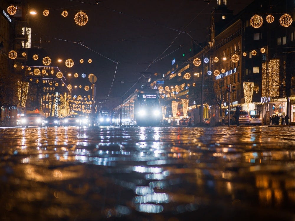 city with lights turned on during night time
