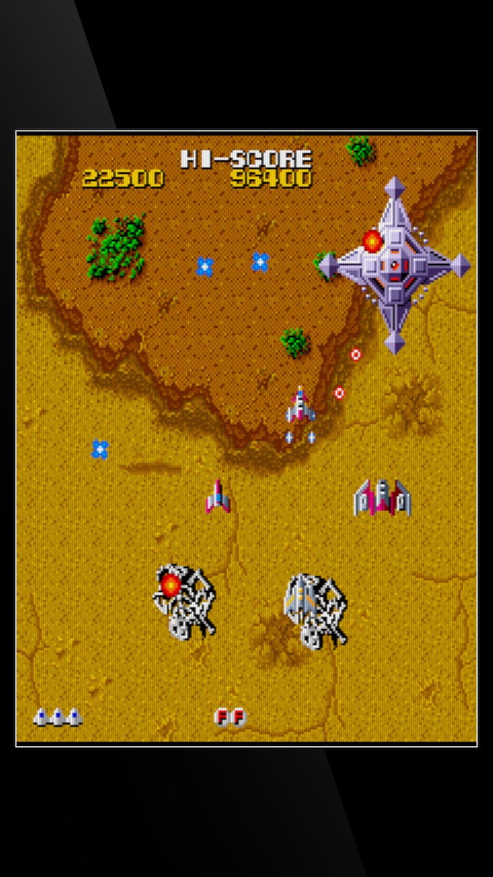 A screenshot captured in the vertical-oriented TATE mode, with dinosaur skeletons, a boss ship, and a four-ship formation. A screenshot captured in the vertical-oriented TATE mode, with dinosaur skeletons, a boss ship, and a four-ship formation.