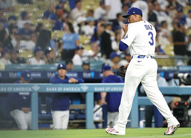Edwin Diaz of the Los Angeles Dodgers reacts as he leaves the game after allowing two runs to score for a 4-4 tie against the Milwaukee Brewers,...
