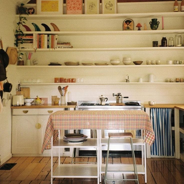 This may contain: the kitchen is clean and ready to be used for dinner or other mealtimes
