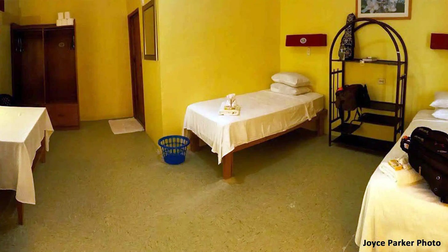 The Bedrooms at the Villages have twin beds, ample storage, a refrigerator, and a table.