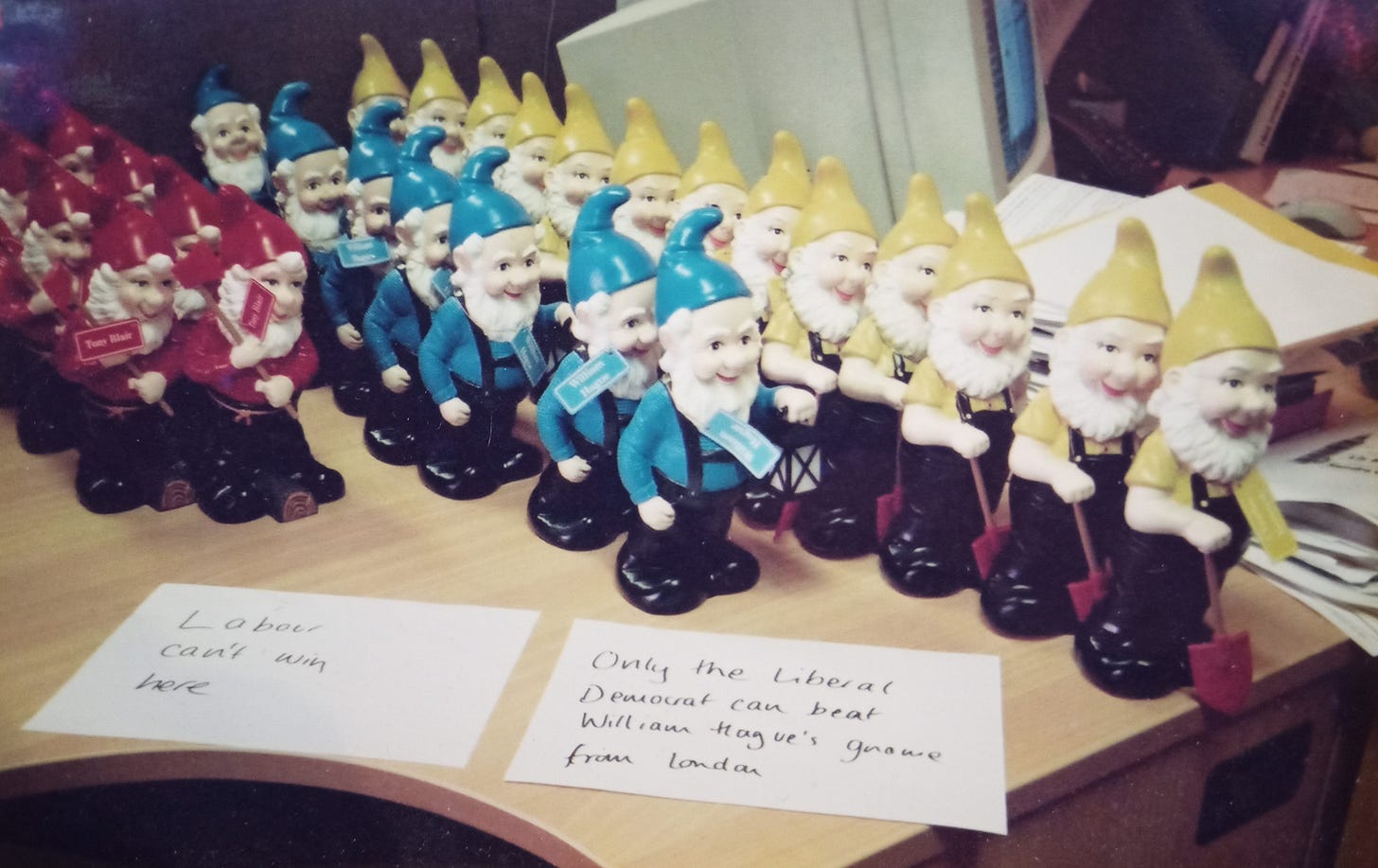 A bar chart made of garden gnomes