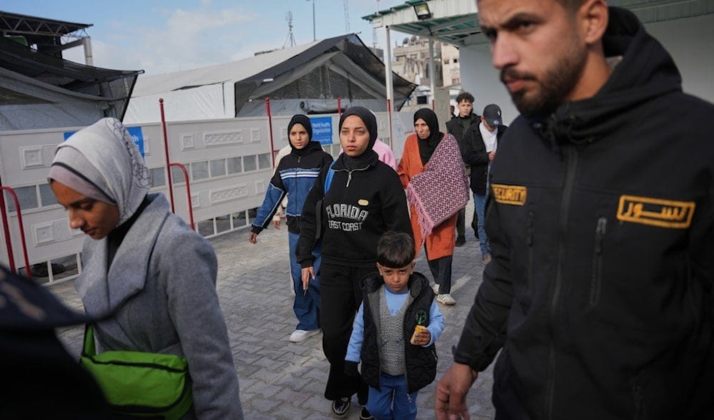 Palestinians patients and their relatives gather to board a bus in Khan Younis before they head to the Rafah crossing, leaving the Gaza Strip for medical treatment abroad, Wednesday, Feb. 4, 2026. (AP Photo/Abdel Kareem Hana)