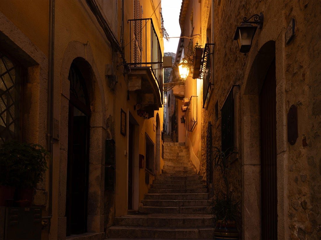A steep stone staircase climbing through Taormina, Sicily. A steep stone staircase climbing through Taormina, Sicily.