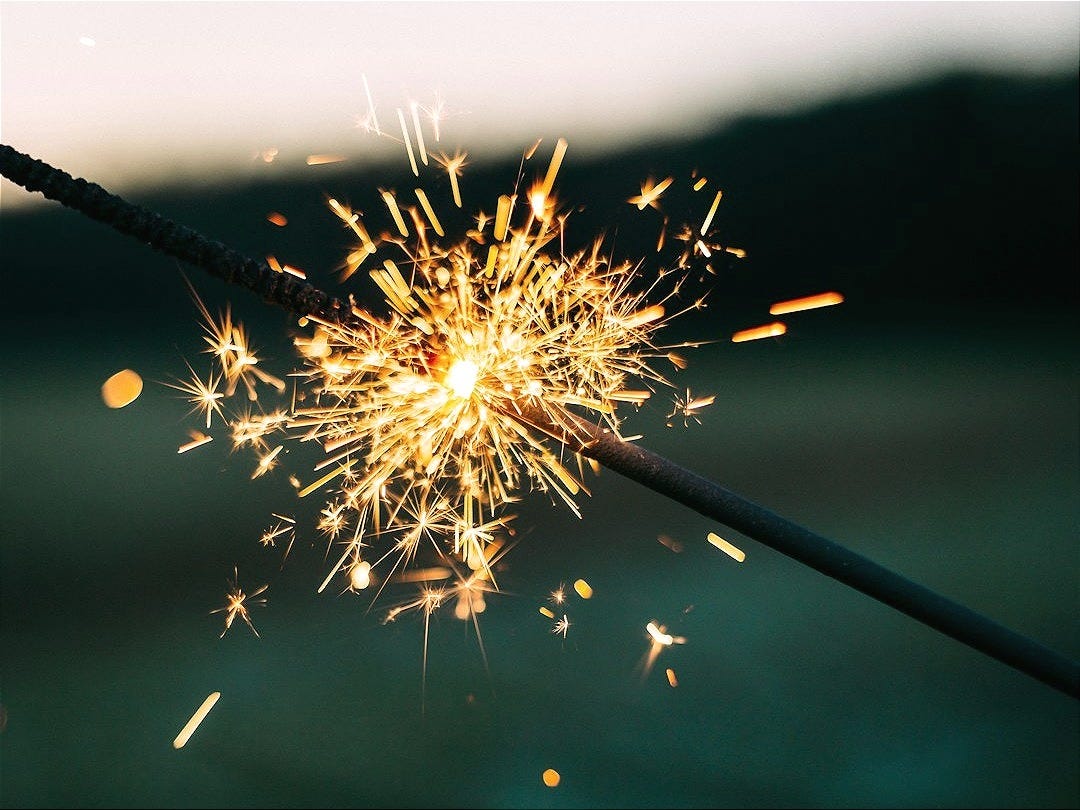 shallow focus photography of sparkler shallow focus photography of sparkler