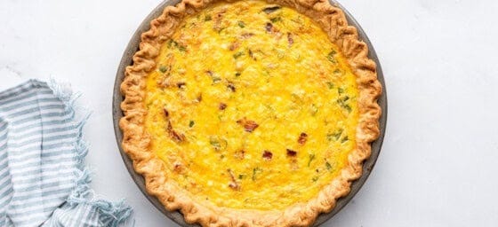 Cottage cheese quiche in a pan after being baked.