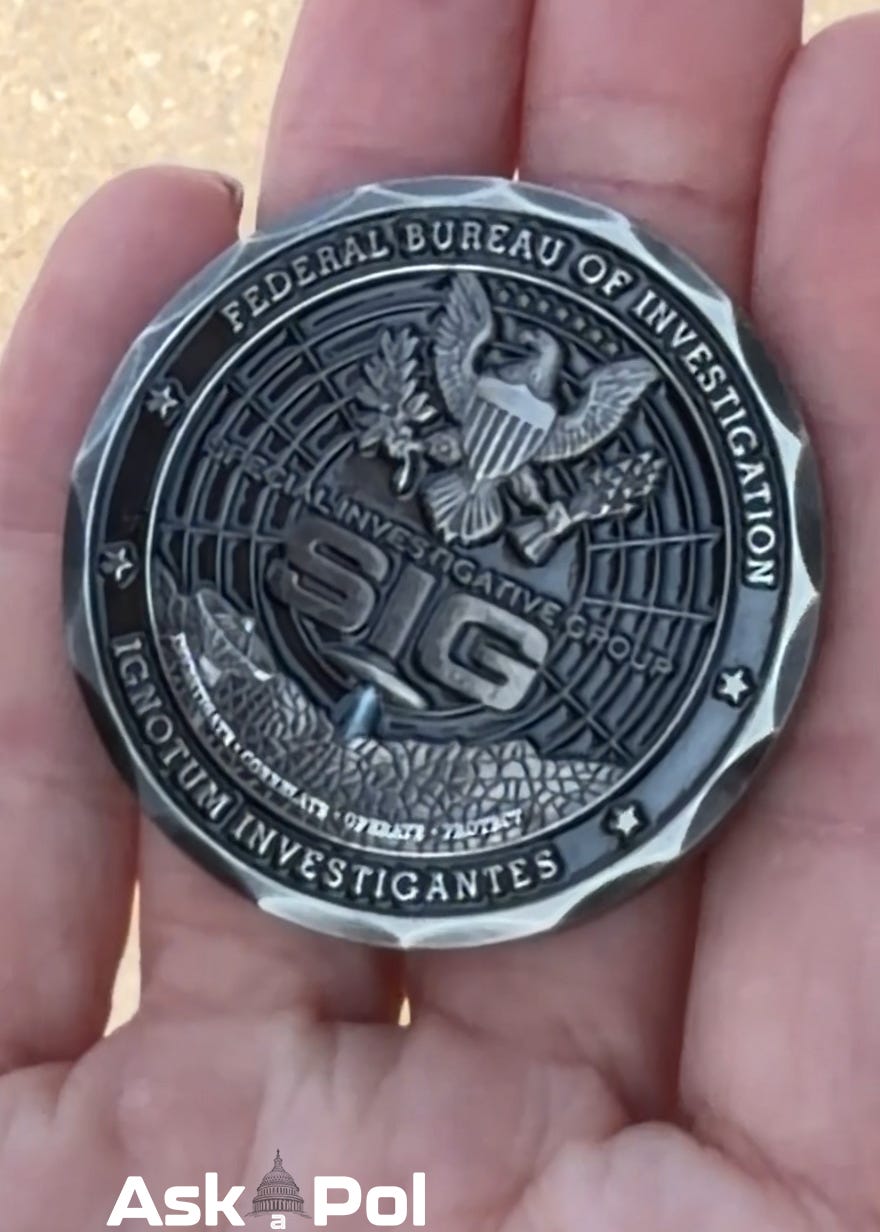 Front of the FBI's new UFO coin 