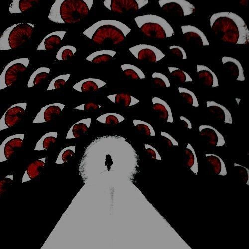This may contain: an image of a person standing in the middle of a tunnel with red circles on it