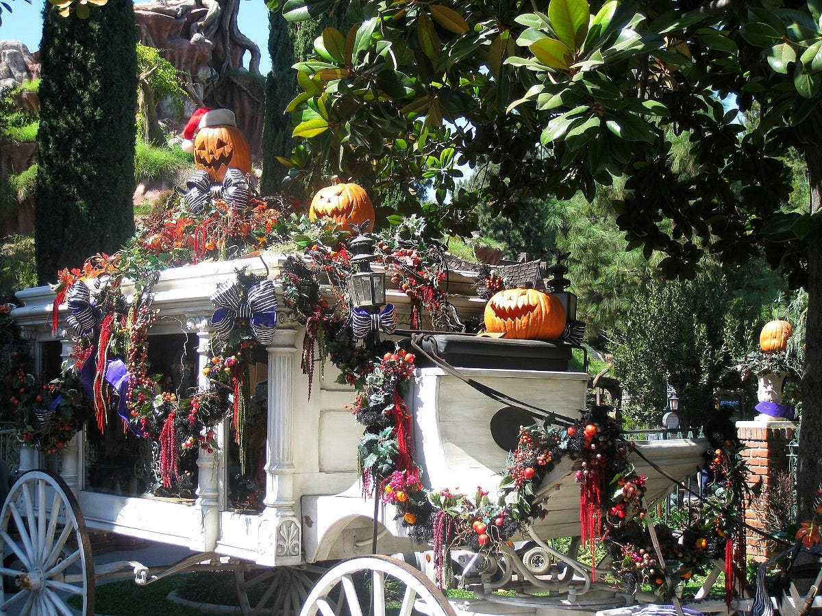 The Haunted Mansion hearse at Disneyland, decorated for Haunted Mansion Holiday in 2010. Image: deror_avi via Wikimedia Commons The Haunted Mansion hearse at Disneyland, decorated for Haunted Mansion Holiday in 2010. Image: deror_avi via Wikimedia Commons