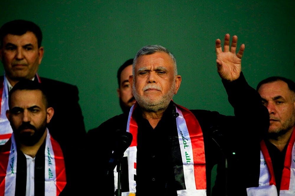 Hadi al-Amiri, the Badr Organization Secretary-General, speaks to his followers during his political block campaign rally before the parliamentary elections in Baghdad, Iraq, Tuesday, Oct. 5, 2021. (AP Photo/Hadi Mizban)