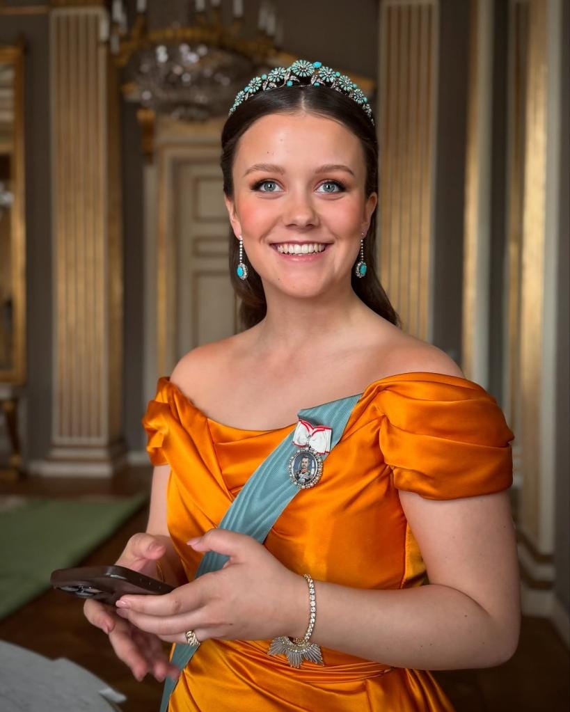 Princess Isabella of Denmark's official portrait divides fans as she's seen  clutching her iPhone