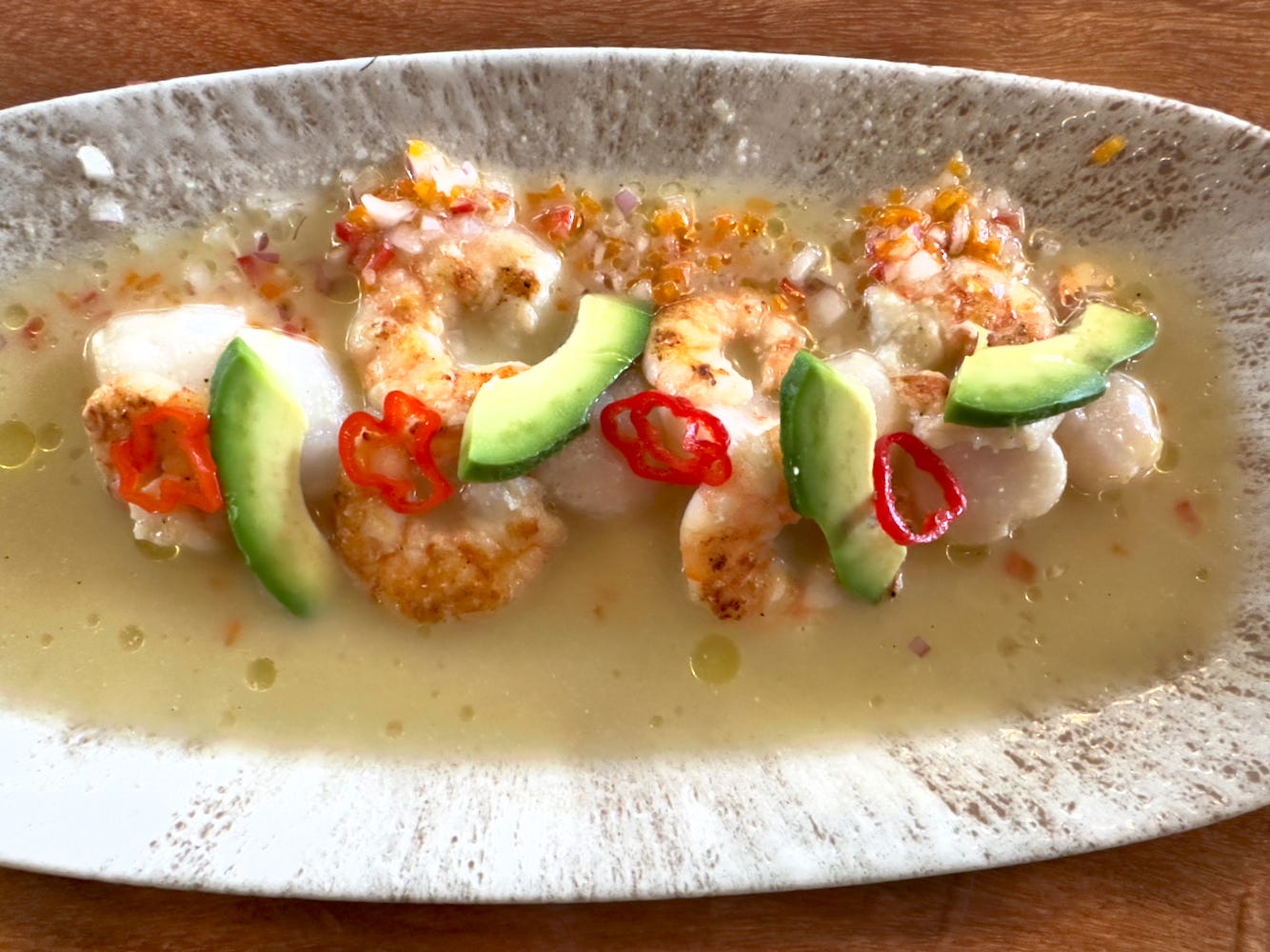 Ceviche with shrimp and scallops at one of Lima's most famous cevichería, El Mercado