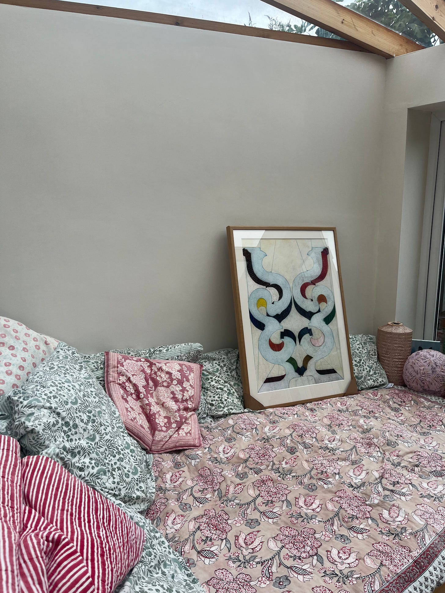 new print leaning on wall